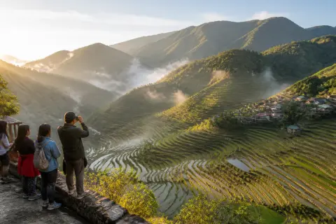 Early-morning Banaue rice terraces with mist and village houses