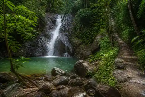 Small forest waterfall and freshwater pool at Bigaho Falls, Sitio Bigaho, Port Barton