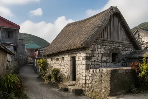 Traditional Ivatan stone house with steep cogon roof in Ivana, Batanes