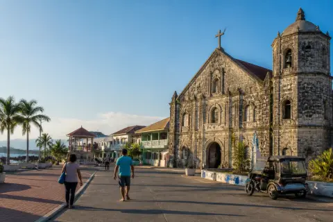 Historic coral-stone church and town plaza on Samar Island