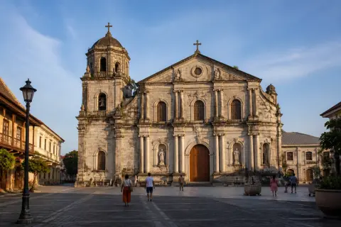 Taal Basilica façade and plaza with surrounding heritage houses
