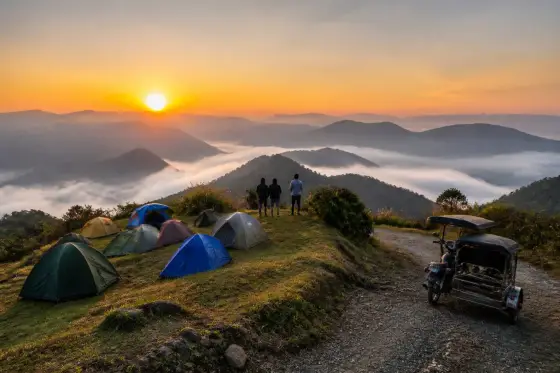 Sunrise view from Treasure Mountain campsite with tents and Sierra Madre ridges