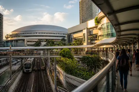 Gateway Mall and Smart Araneta Coliseum cluster with pedestrians on skybridges in Cubao