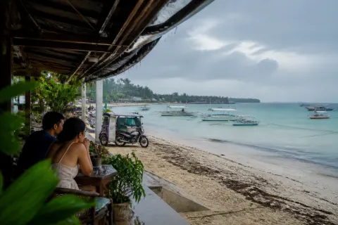 Covered beachfront café and wet sand at Santa Fe, Bantayan Island