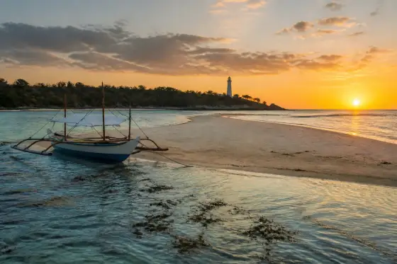 Calatagan sunset with sandbar and small banca boat