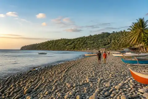 Pebble beach near Surigao City at late-afternoon light