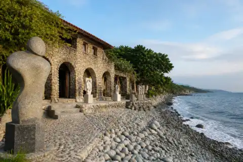 Bahay na Bato stone gallery and pebble coast in Luna, La Union