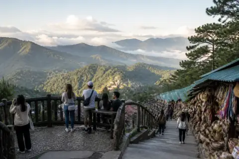 Mines View Park observation deck overlooking mountain ridges with souvenir stalls on the approach