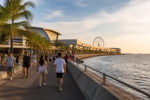 People walking on the SM Mall of Asia seaside promenade in Pasay