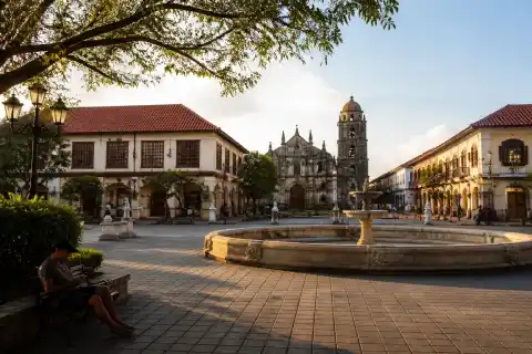 Plaza Salcedo civic square in Vigan with fountain basin and colonial buildings