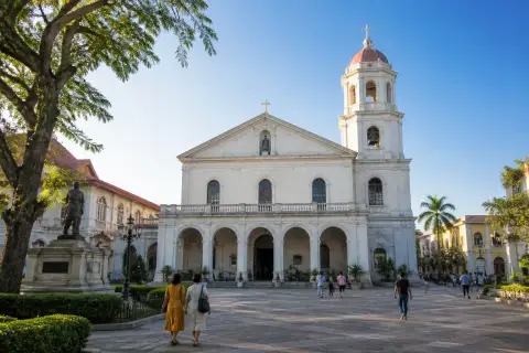 St. Joseph the Worker Cathedral façade and bell tower with Plaza Rizal in Tagbilaran