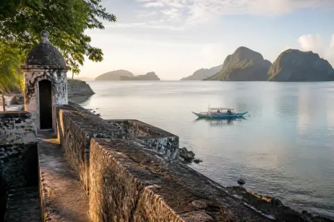 Fort Santa Isabel ramparts and Taytay Bay with limestone islands