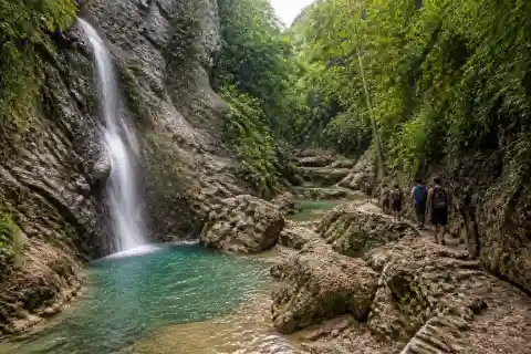 Ka‑Tinggo Falls and natural pools at Esoy Hot Spring, Catmon, northern Cebu