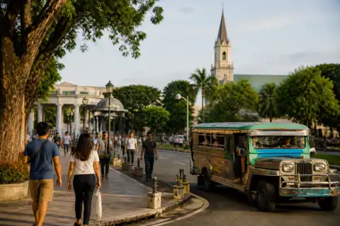 Pedestrians and a jeepney near Gaston Park and Divisoria in Cagayan de Oro