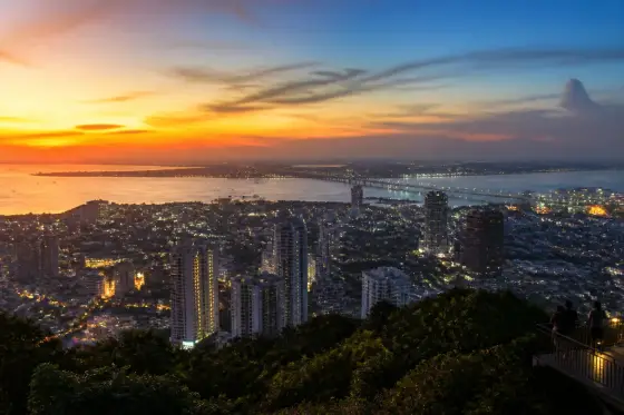 Cebu City skyline and coastline at sunset from an elevated viewpoint