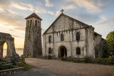 Stone façade and bell tower of Our Lady of the Immaculate Conception Church, Oslob