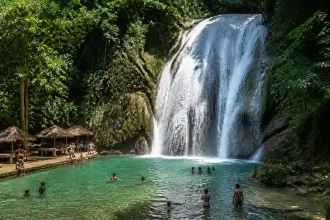 Daranak Falls main cascade, pool and picnic area with visitors